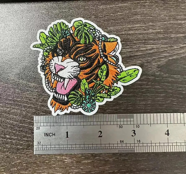 Detailed tiger embroidery with size reference