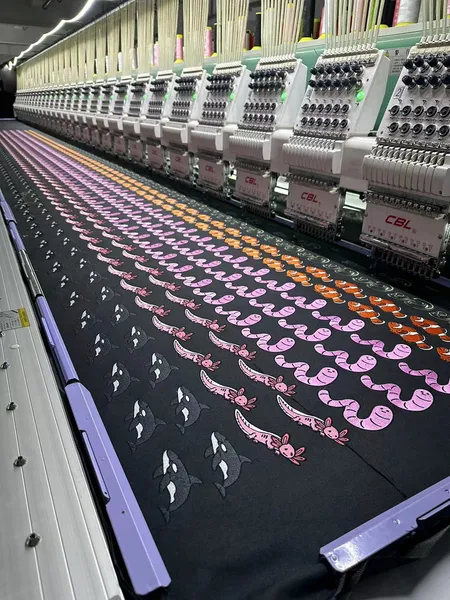 Pink design embroidery in progress